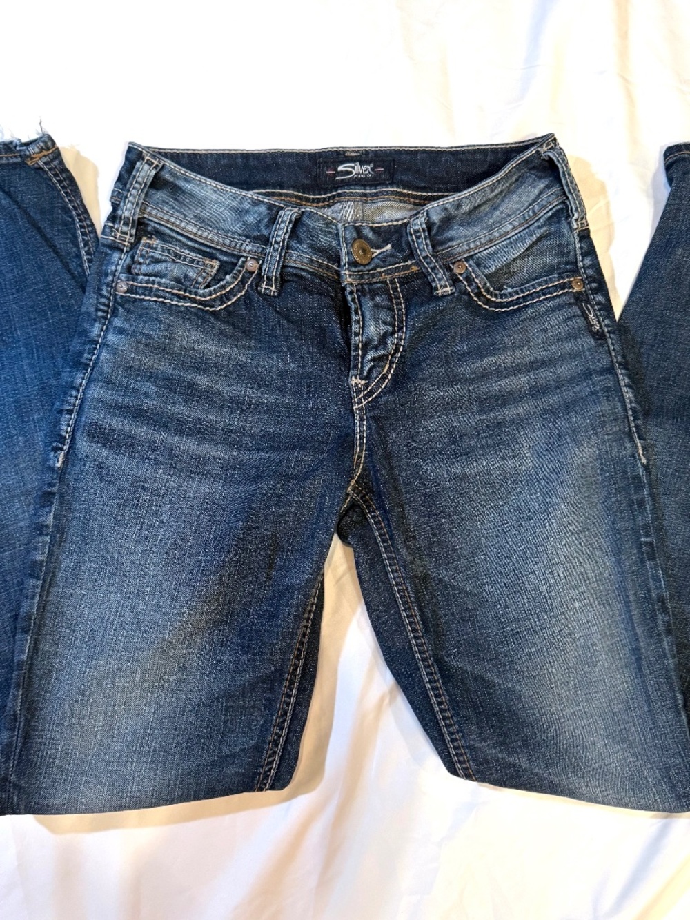 Silver Jeans Elyse Mid Skinny lightly distressed hem stretch W26/L31